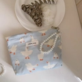 Detail of blue duck print fabric pouch with pearl chain strap and simple wish label - Light Blue White Goose