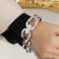 Polished silver chunky link chain bracelet in stainless steel on woman's wrist - Z082-Steel Silver Bangle