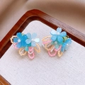 Detailed view of handmade blue resin flower earrings with colorful beads on wooden tray - 54# Silver Pin-Blue