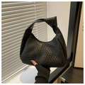 Detail der schwarzen geflochtenen Ledertasche mit Knotengriff und Reißverschluss - Schwarz