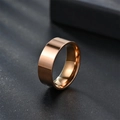 Macro shot of 8mm rose gold polished stainless steel ring with flat outer surface - US 8 / Rose Gold
