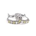 Fashionable silver hoop earrings with yellow and white zircon gemstones on white background - Yellow