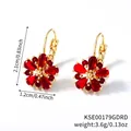 Detailed view of rose gold flower earrings with red crystals and dimensions 2.1cm by 1.2cm - Gold Red
