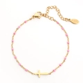 Gold stainless steel cross bracelet featuring pink beads and an adjustable chain - Peach Pink