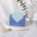 Blue heart-shaped greeting card with Best Wishes text on elegant ceramic plate - Blue