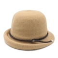 Detail of beige knit cloche hat showing woven texture and decorative leather cord with buckle - M (56-58cm) / Camel