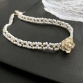 Double-layer woven pearl necklace with white camellia flower pendant and golden accents - 05-D16 Camellia Faux Pearl Choker