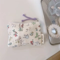 Detailed view of floral pattern pouch with small duck and hedgehog motifs on cream fabric - Cream Cartoon Animal & Branches