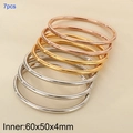 Set of 7 minimalist oval open bangles in rose gold, gold, and silver stainless steel - 7 Rings (KB205318-LO)