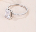 Vintage-Silberring mit Zirkonia im Smaragdschliff und Pavé-Besatz auf der Schiene - US 6 / Silber
