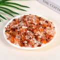 Polished natural orange and clear crystal quartz chips in a minimal white bowl - 100g Of Red Crystal (7-9mm)