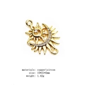 Macro shot of gold sun charm in copper with zircon inlays for jewelry making - Sunbeam Connector