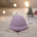 Lavender knitted hat scented candle with realistic texture on a cozy book background - Purple Hat - Lavender