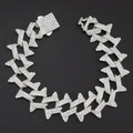 Detailopname van een zilverkleurige Cuban link armband met fonkelende strassteentjes - 18cm(7inch) / Zilver
