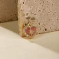 Pendentif cœur doré avec pierre rose et motif d'étoile sur un socle en pierre - Rose/Pendentif à Boucle Unique