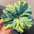 Detailed macro view of green elastic bubble fabric scrunchies with pleated texture - Green Scalloped Edge (1 Pack of 50)