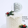 Silver round Merry Christmas acrylic cake topper inserted in a festive pine cake - Round Christmas Ball / Silver