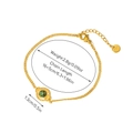 Detail of gold stainless steel bracelet featuring a green stone inlay and lobster clasp - Round Green Textured Stone - Bracelet 11