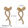 French vintage style bow-shaped dangle earrings with gold plating and sparkling zircons - Pavé Rhinestone Bow Drop Style (NB-E1384)