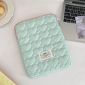 Mint green heart-quilted iPad sleeve with Happy patch and zipper closure on a desk - 11" / Green