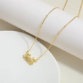 Collana con ciondolo a forma di granchio dorato con strass brillanti e catena sottile - Granchio