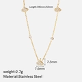 Collier doré en acier inoxydable avec feuille de ginkgo pavée et détails en diamant - Ginkgo