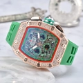 Detail of tonneau watch with diamond bezel, skeleton dial, and green rubber strap - Green Dial Rose Gold Case Green Strap