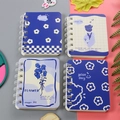 Set of four mini A7 spiral notebooks in blue and purple floral and grid patterns - Blue Rose
