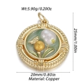 Detail of a golden pendant with floral pattern, pearl inlay, and copper material specs - Green Plant Round Pearl