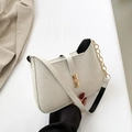 Chic beige faux suede handbag with gold chain strap and elegant metallic lock - White