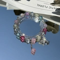 Exquisite beaded bracelet with blue pearls and a silver butterfly charm on a reflective surface - S042-colored Crystal Butterfly Bracelet #sz306