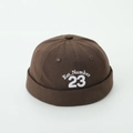 Close-up of dark brown cotton skull cap with Est. Number 23 embroidery and vent holes - Letter 23 Style / Brown