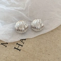 Detailed view of silver round stud earrings featuring unique water ripple texture design - Wavy Round Style (HE27807) / Silver