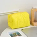 Bright yellow quilted floral cosmetic bag with soft texture and secure zip closure - Irregular Yellow Flowers