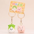 Porte-clés couple créatif cochon et chou avec expressions drôles en résine souple - Cochon creusant le chou