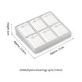 Grey 6-slot jewelry display tray for earrings, measuring 17x13.5x4cm with white pads - 6-Slot Earring Tray (White & Silver)