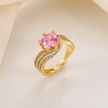 Macro view of a gold-plated ring featuring a pink zircon and wavy micro-pave band - Gold Pink Zircon