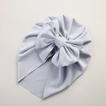 Close-up of light blue baby turban hat with a big bow and waffle texture fabric - 21*17 cm / Grey Blue
