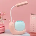 Pink snail shaped LED reading lamp with flexible neck and blue pen holder base - Snail Style / Pink