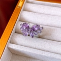 Detail view of a purple butterfly zircon ring with silver setting in a jewelry box - Silver Purple Butterfly Style
