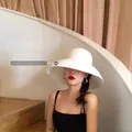 Detail of a white wide-brim straw sun hat for women providing sun protection and shade - Adjustable / White Wide Brim
