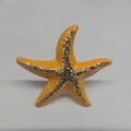Starfish open ring in vibrant orange enamel with golden textured metal center - Yellow