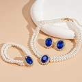 Dettaglio set gioielli doppia fila di perle con pietre blu ovali in castone dorato - Set da 3 pezzi / Blu Ovale(HN9001)
