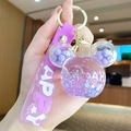 Purple bubble tea bear keychain with drifting liquid and glitter on a golden ring - Mickey Head Bubble Bead - Purple