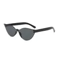 Fashionable black cat eye sunglasses with dark grey lenses in a glossy finish - Gray