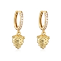 Macro detail of gold strawberry earrings featuring cubic zirconia pavé and 18K plating - Gold Textured Strawberry Hoop Earrings
