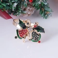 Christmas bell napkin ring with gold bow and rhinestones on a festive pine background - Red Green Double Bell Bow Style