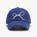 Navy blue baseball cap featuring a white embroidered bow on high-quality cotton fabric - Sapphire Blue