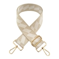 Detail of adjustable woven bag strap with beige and white geometric patterns and gold clips - No.10 Rice White