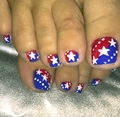Unghie finte piedi con stelle rosse, bianche e blu in stile bandiera americana - FW58